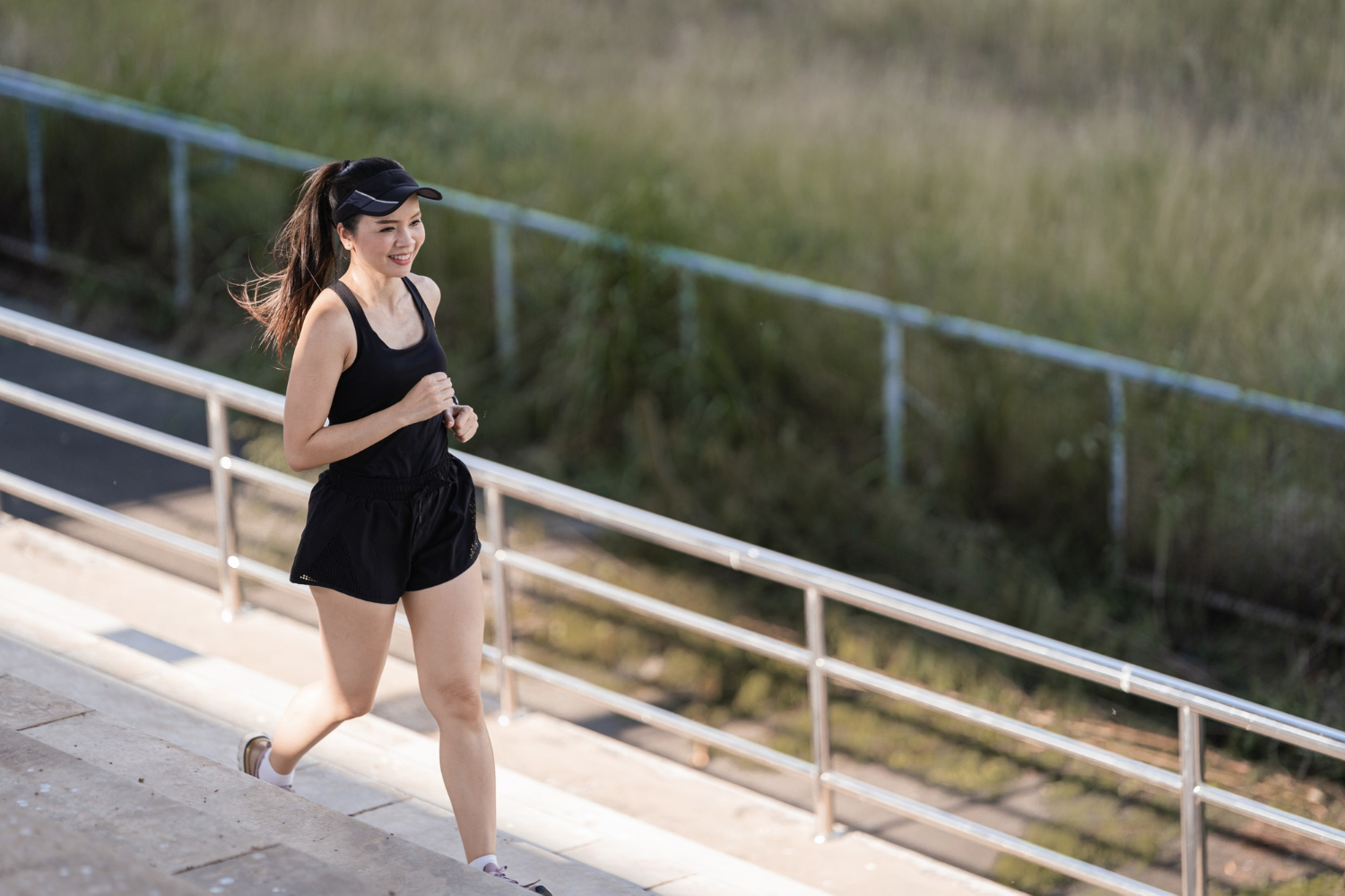 healthy-happy-asian-woman-runner-black-sport-outfits-jogging-natural-city-park-evening-sunset