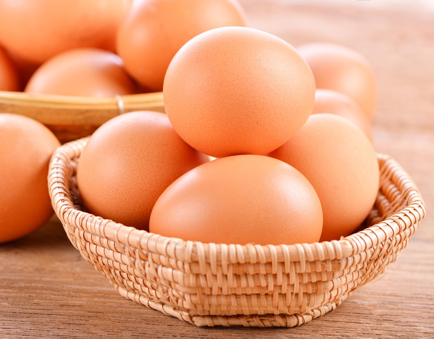 Chicken eggs in basket on grey wooden backgroundfood high protien