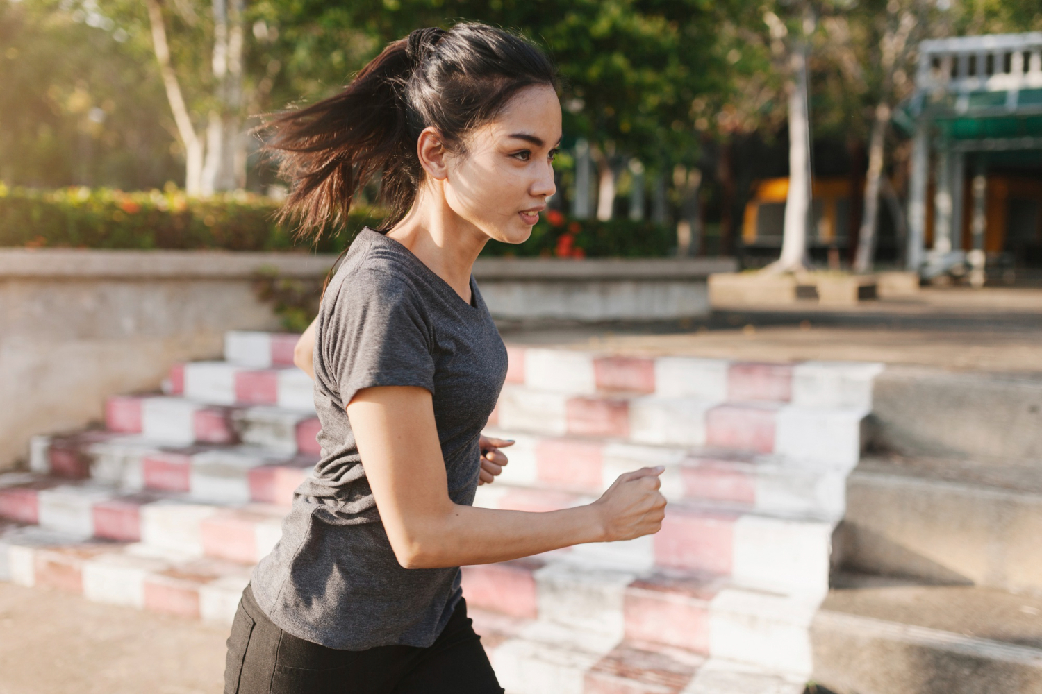 Pretty girl running in the city