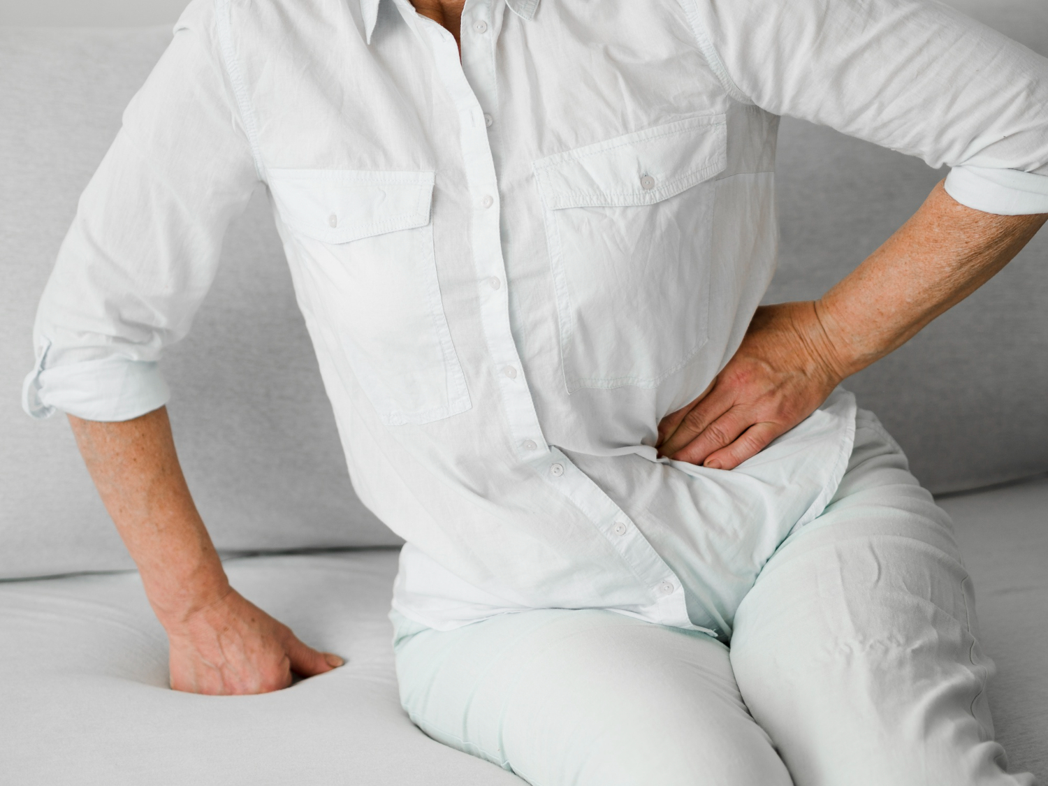 Old patient sitting on couch